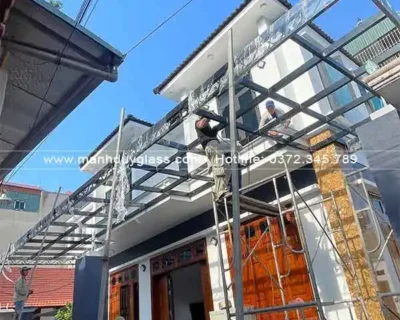 Công trình mái kính cường lực dán 11,52 kính xanh đen